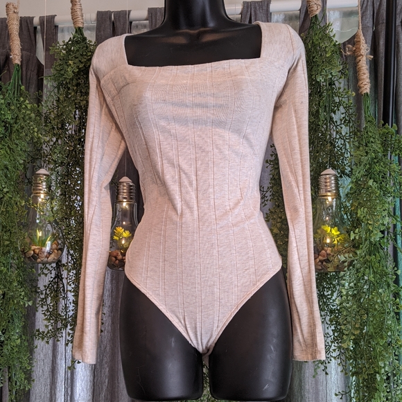 FREE PEOPLE long sleeved bodysuit Size M